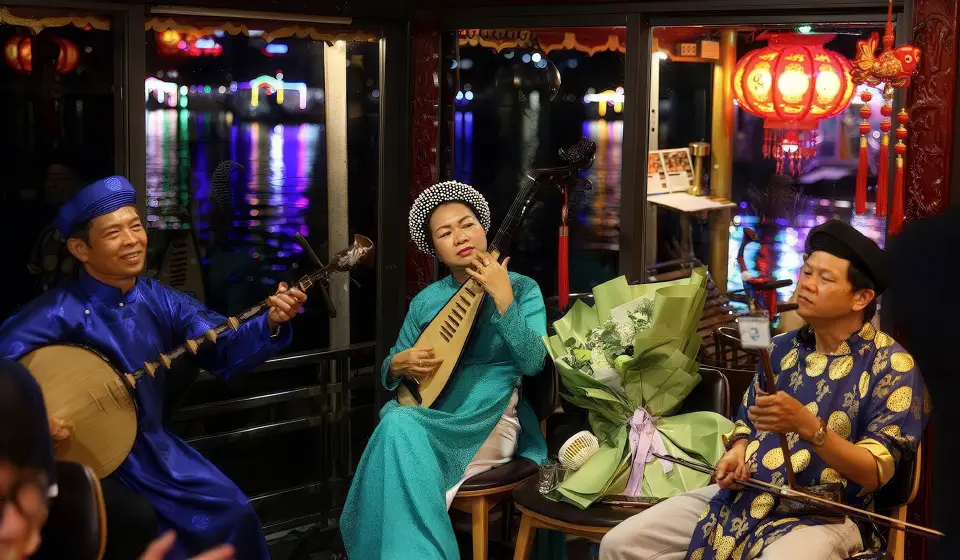Ca Hue folk musicians performing live on board